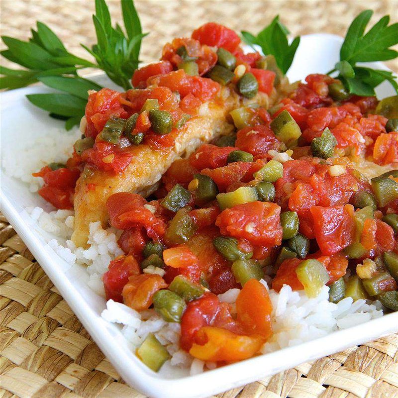 Chicken piquant served over rice