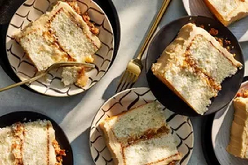 Slices of caramel apple cake served on plates with forks