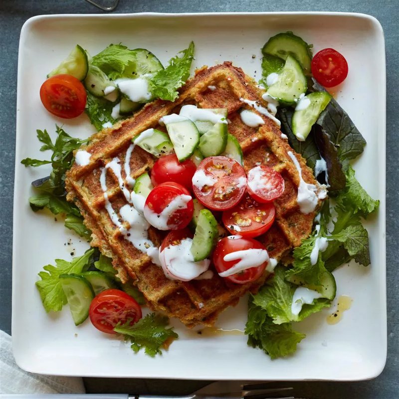 Waffled falafel served with toppings